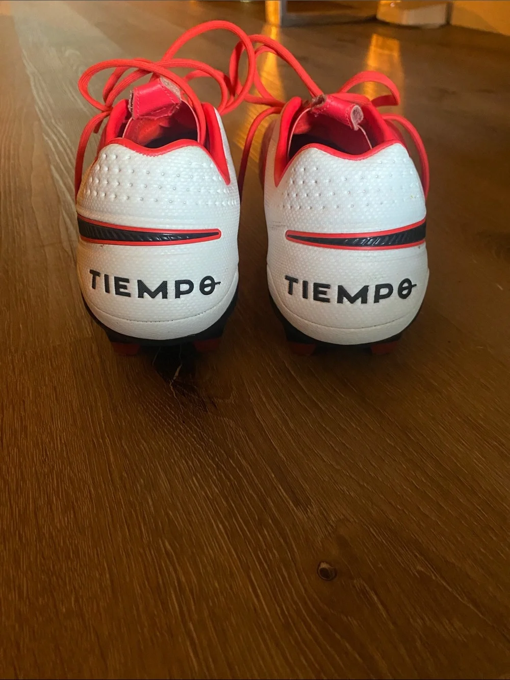 Nike Tiempo Soccer Cleats in White and Red